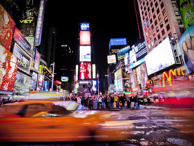 times square ,is a busy tourist intersection of neon art and commerce and is an iconic street of new york city and america, november 13th, 2011 in manhattan, new york city, traditional advertising