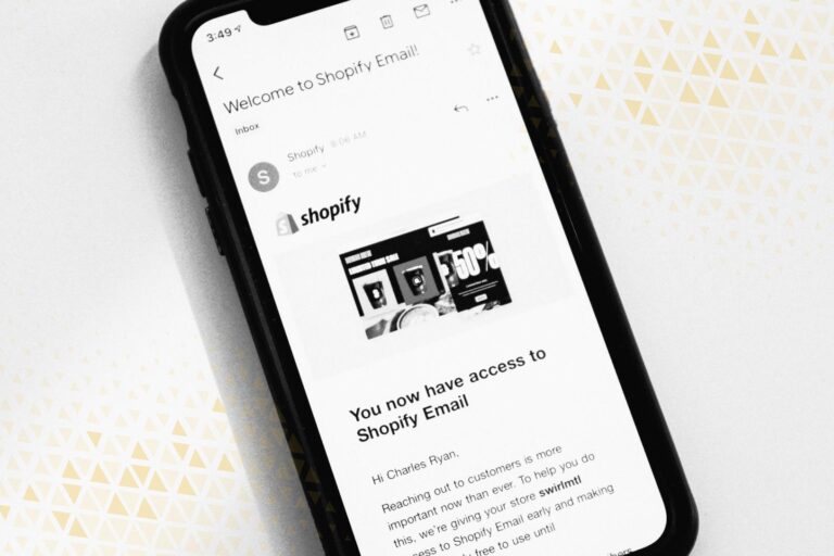 an image of a smartphone displaying an email branded by Shopify