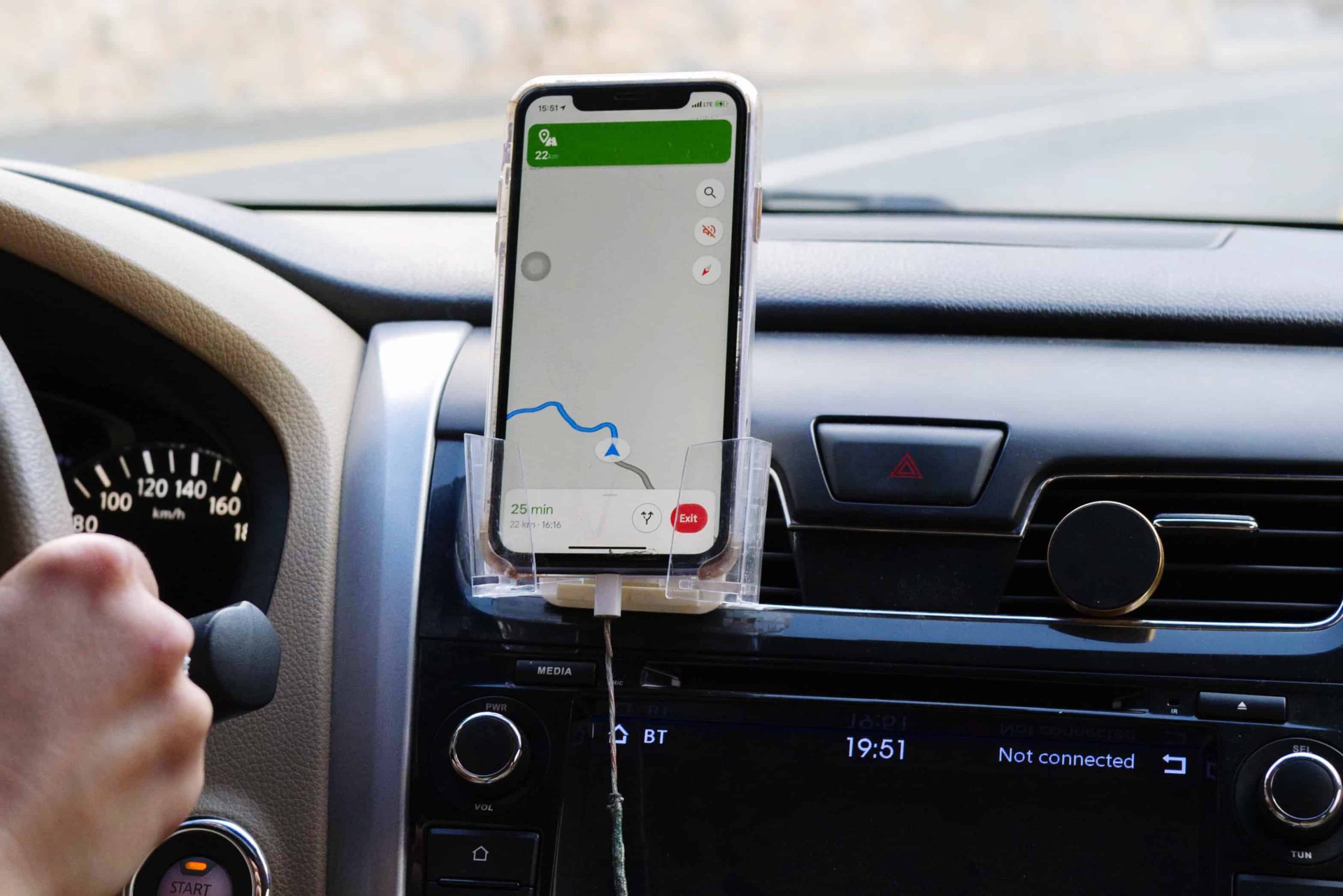 driver uses local maps feature to find a business