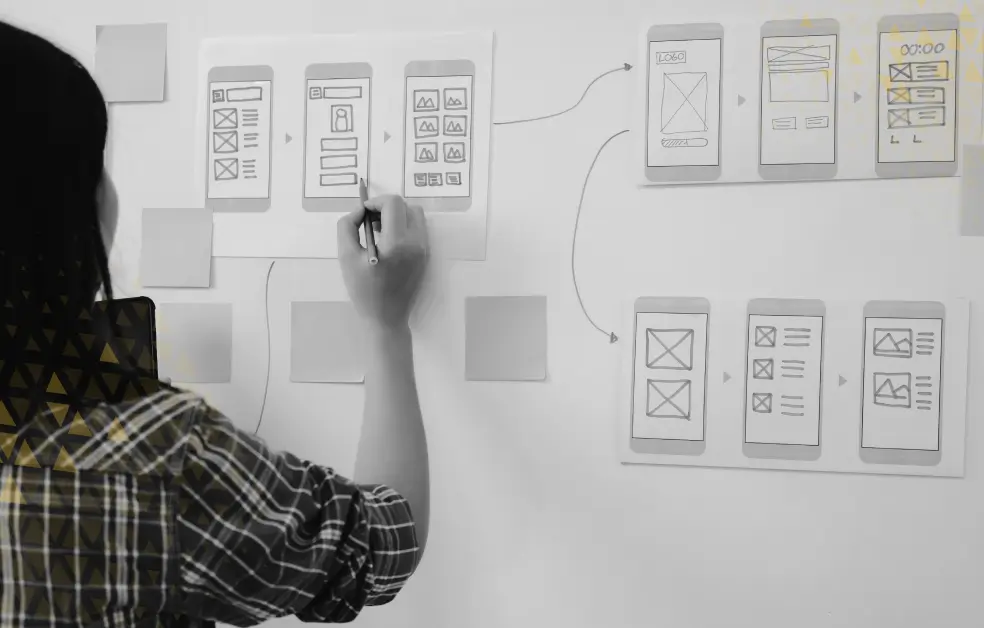UI/UX designer mind-mapping a user journey